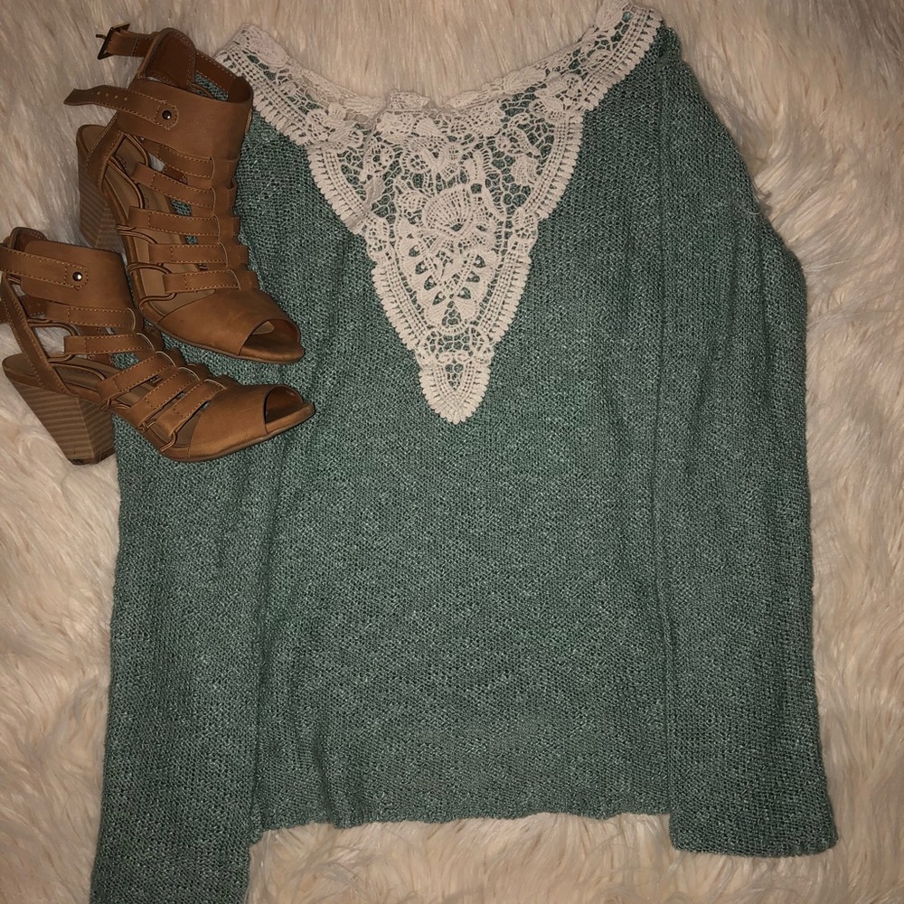 Cute green lace sweater.